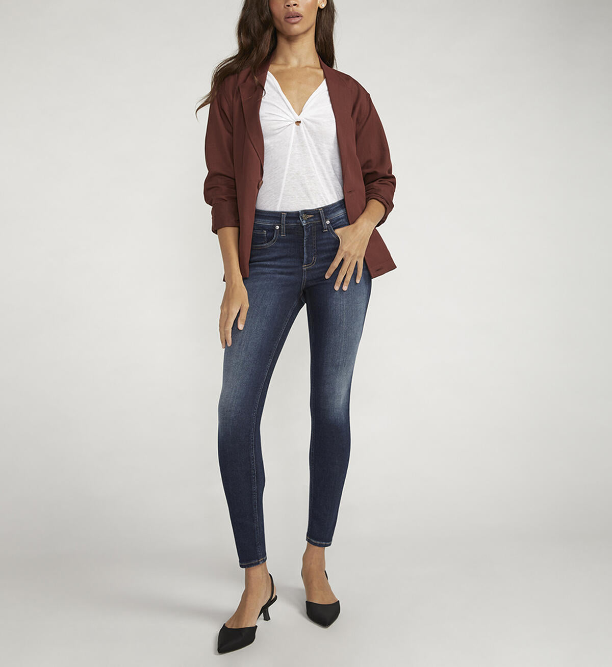 Infinite Fit Mid Rise Skinny Jeans