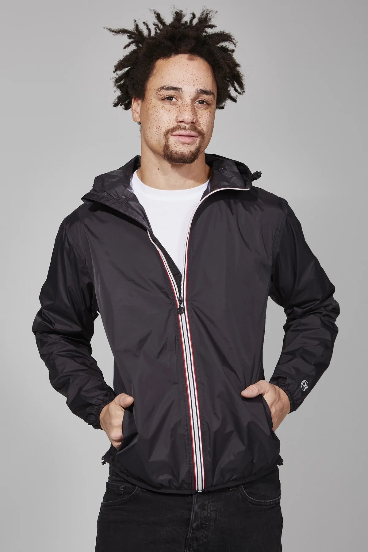 Black full zip packable rain jacket and windbreaker